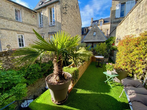 Deluxe suite, uitzicht op tuin (La Chapelle) | Terras