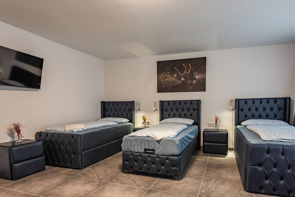 Comfort Quadruple Room | Individually furnished, desk, laptop workspace, free WiFi