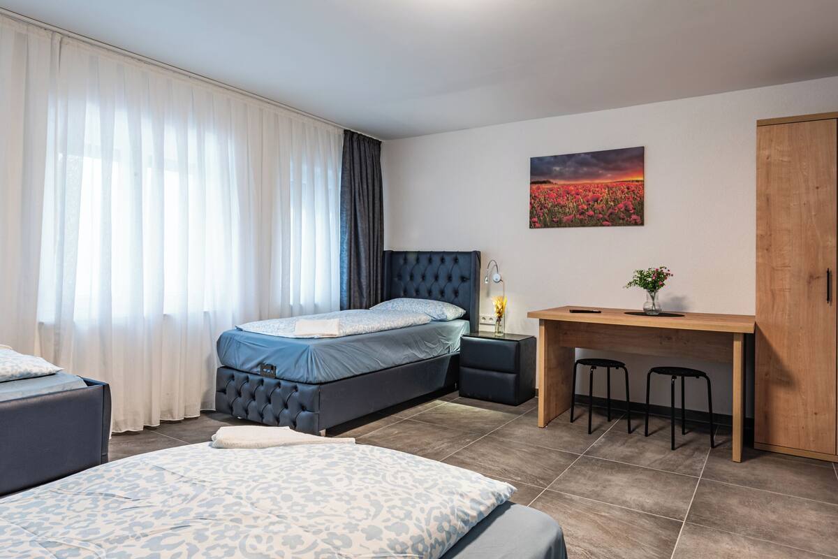 Comfort Quadruple Room | Individually furnished, desk, laptop workspace, free WiFi