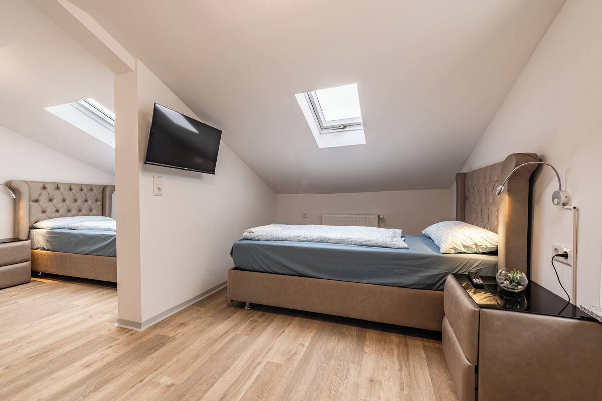 Comfort Quadruple Room | Individually furnished, desk, laptop workspace, free WiFi