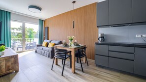 Studio (107G) | Private kitchen | Fridge, stovetop, electric kettle, cookware/dishes/utensils