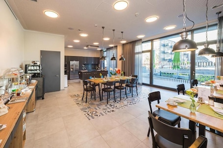 Daily buffet breakfast (EUR 14 per person)
