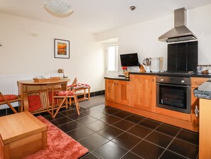 Fridge, electric kettle, toaster, cookware/dishes/utensils