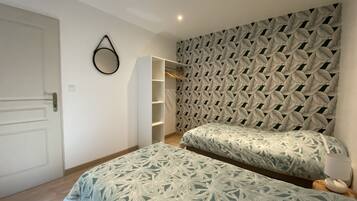 2 habitaciones y ropa de cama