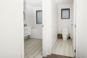 Bathtub, hair dryer, towels