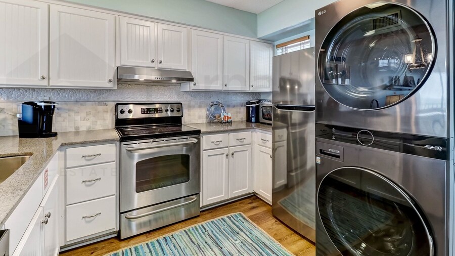 Beach Style Condo Includes Google Mini Home And Beach Access 2 Bedroom Condo by RedAwning