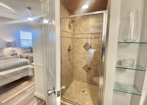 Shower, hair dryer, towels, soap
