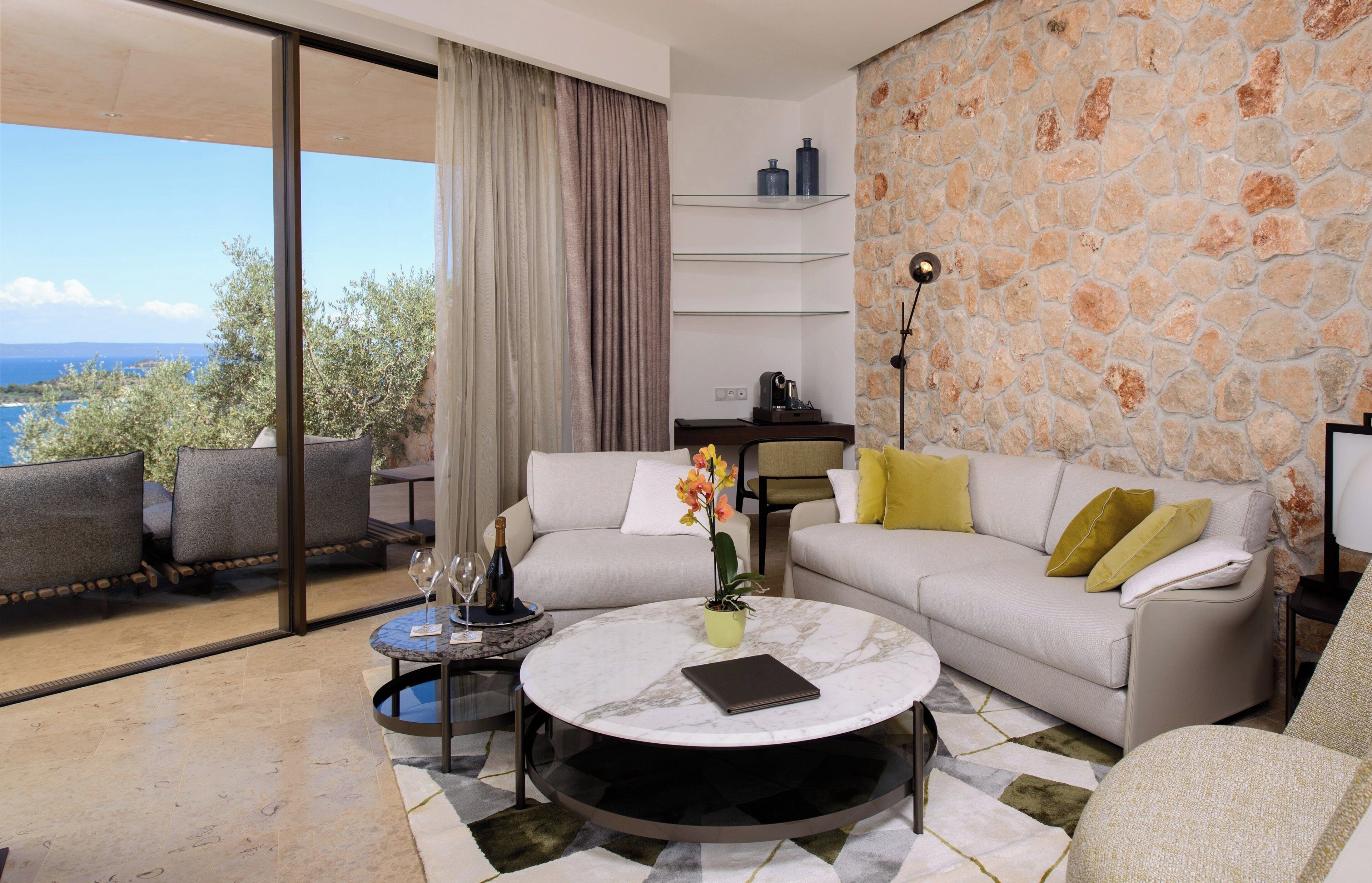 Luxury Suite with Terrace and Sea View | Living area | 110-cm LED TV with cable channels, TV, printers