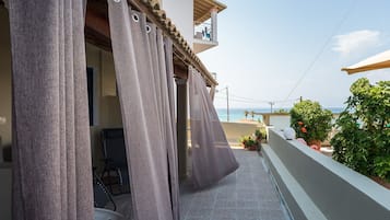 Luxury Room, 1 King Bed with Sofa bed, Sea View | Terrace/patio