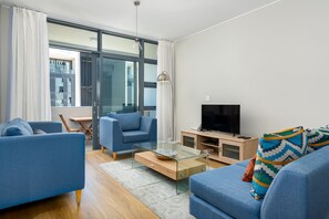 Signature Apartment | Living area | 42-inch flat-screen TV with cable channels, TV - The Axis 109 (Cape Town)