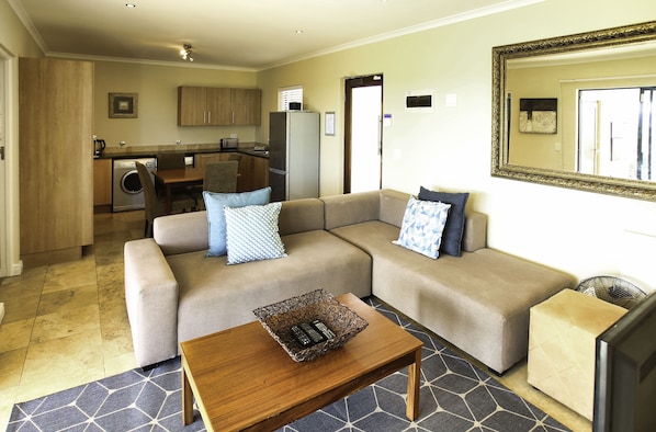 Basic Apartment | Living area | 32-inch LED TV with satellite channels, TV