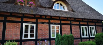 Romantische Reetgedeckte Bauernhaushälfte in Alt Rehse