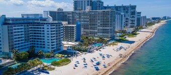 Sunlit suite with a city view & fast WiFi plus a pool, & beach access