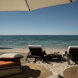 On the beach, free beach cabanas, beach umbrellas, beach towels