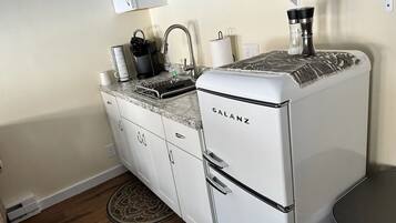 Fridge, microwave, coffee/tea maker, toaster