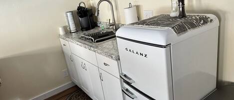 Fridge, microwave, coffee/tea maker, toaster