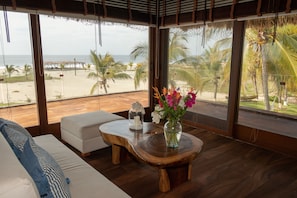 Chambre Quadruple Deluxe | Vue sur la plage/l’océan