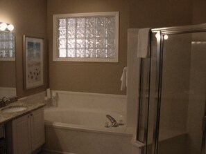 Combined shower/tub, towels, soap, toilet paper