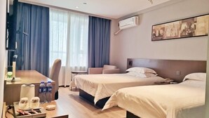 A hotel room with two beds, a desk with a chair, a TV, and a window with curtains. - Jinjiang Inn Select (Yangzhong Middle Yangzi Road) (Yangzhong)