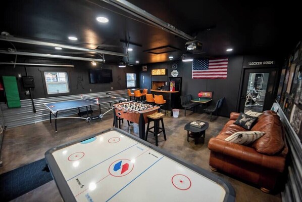 Game room - Urban Edge | Comfort & Fun: Large Game Room & Fitness Room (Decorah)