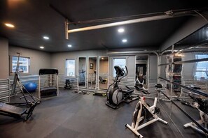 Fitness facility - Urban Edge | Comfort & Fun: Large Game Room & Fitness Room (Decorah)
