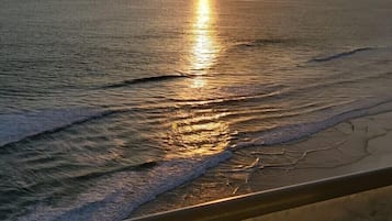 On the beach, sun-loungers, beach towels