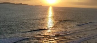 Relaxed Spanish beachfront condo w/private parking & private balcony ocean views