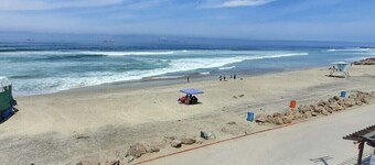 Relaxed Spanish beachfront condo w/private parking & private balcony ocean views