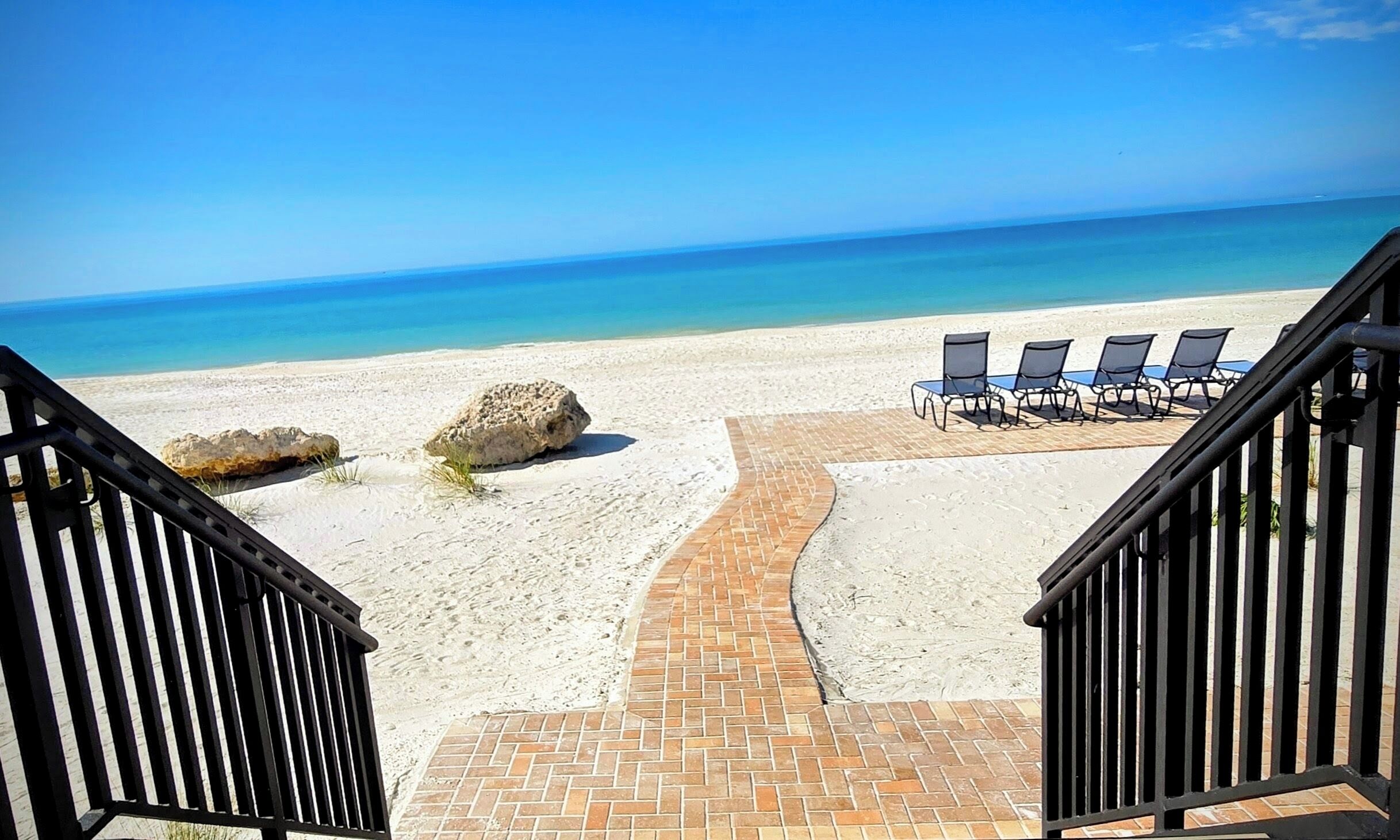 On the beach, sun loungers