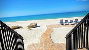On the beach, sun loungers