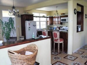 Fridge, microwave, toaster, cookware/dishes/utensils