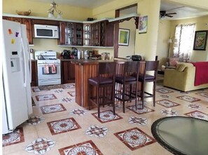 Fridge, microwave, toaster, cookware/dishes/utensils