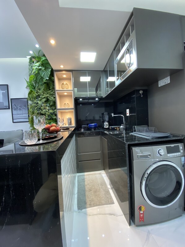 Fridge, microwave, coffee/tea maker, toaster