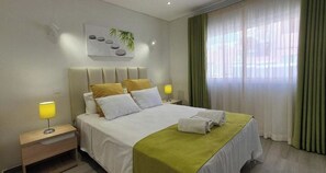 3 habitaciones, tabla de planchar con plancha, wifi y ropa de cama 