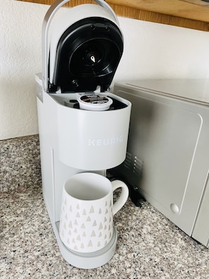 Fridge, microwave, stovetop, coffee/tea maker