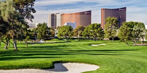 Enjoy a round of golf amidst lush greenery and scenic views.