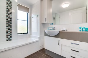 Combined shower/bathtub, hair dryer