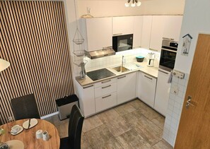 Fridge, microwave, oven, stovetop - Vacation home Im Groden 3 No. 2 (Wittmund)