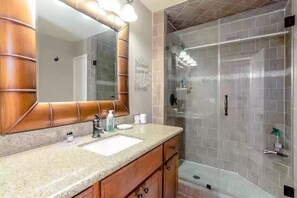 Bathtub, hair dryer, towels, soap