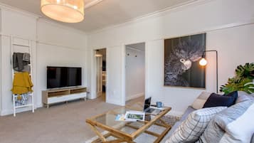 60-inch flat-screen TV with digital channels, TV, Netflix