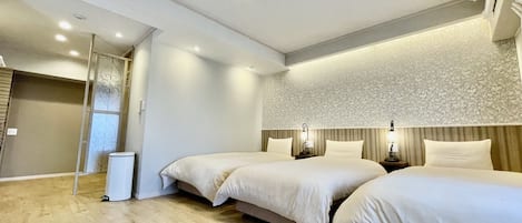 Chambre Triple, non-fumeurs | 3 chambres, Wi-Fi gratuit, draps fournis