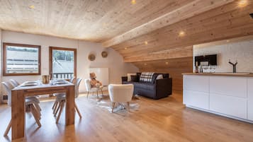 Comfort Apartment, Ensuite, Mountain View (Le Passon) | Living room | 40-inch flat-screen TV with satellite channels, TV, fireplace