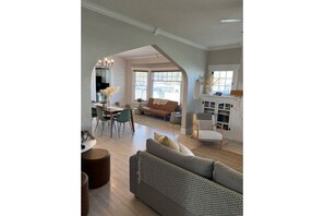 Smart TV, fireplace, table football, books