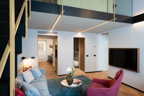 Design Apartment | Living area | 25-inch Smart TV with cable channels, TV