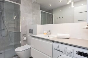 Shower, hair dryer, shampoo