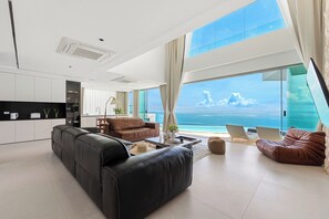Exclusive Villa, 5 Bedrooms, Sea View | Living area | 65-inch Smart TV with digital channels, TV