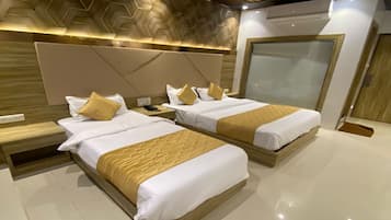 Deluxe Triple Room | Memory-foam beds, desk, laptop workspace, free WiFi