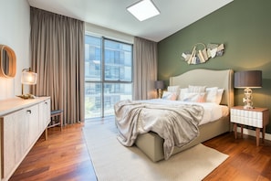 Luxury Apartment, City View | 2 bedrooms, in-room safe, blackout drapes, iron/ironing board