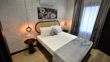 Habitación triple Confort | Wifi gratis y ropa de cama