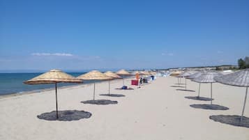 Private beach nearby, sun-loungers, beach umbrellas